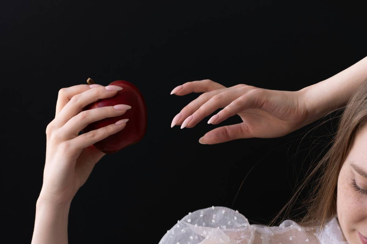 Split image: left shows raw, cracked climber's hands with torn calluses; right shows same hands protected by breathable climbing gloves with padded palms